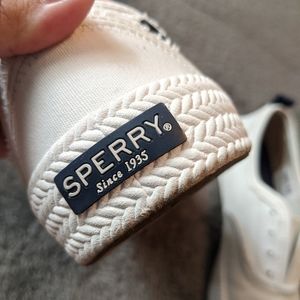 White Sperry slip ons